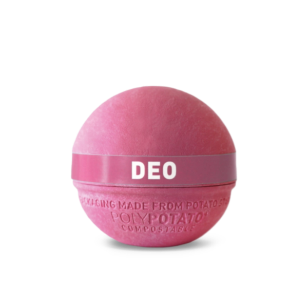 Natural deodorant cream in potato based packaging, a pink sphere with lid on