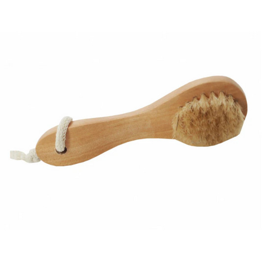 Natural exfoliating face brush with wooden handle and cotton hanging loop