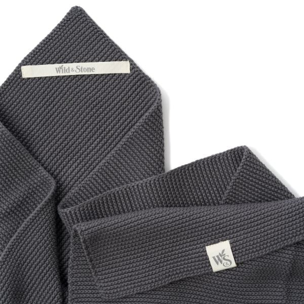Knitted cotton hand towel in Slate grey shown close up
