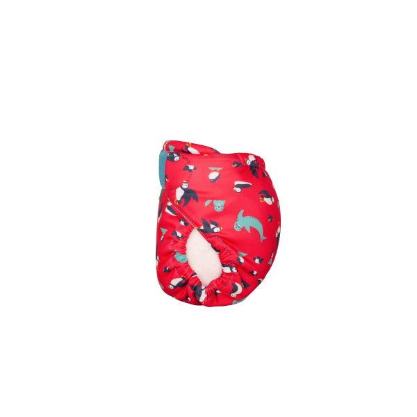 Reusable swim nappy side view in Puffling Paddle design (red background with puffins and seals)