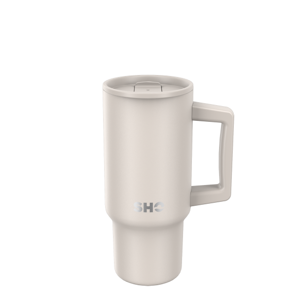 SHO reusable insulated large tumbler in taupe shown with sipper lid