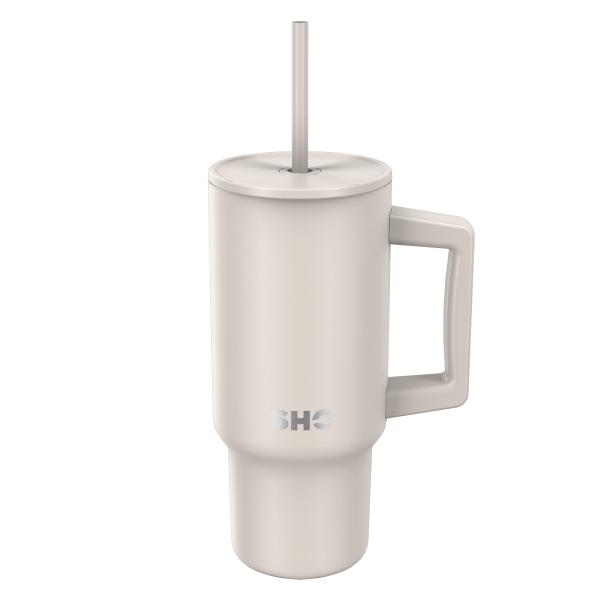 SHO reusable insulated large tumbler in taupe shown with straw l