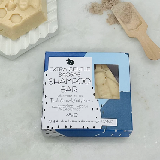 Extra gentle baobab shampoo for curly hair shown in cardboard packaging