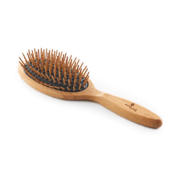 Bamboo hairbrush with wooden bristles in oval shape with black base at bottom of bristles