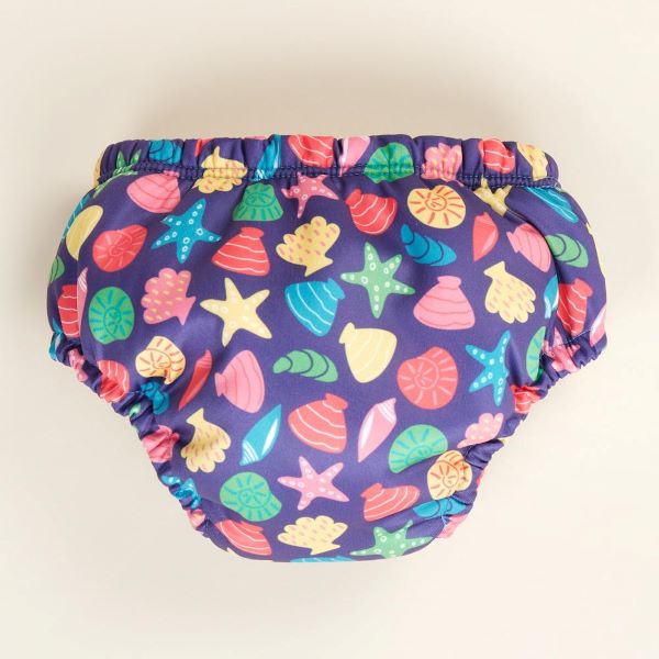 Reusable swim pants back view in Mussel Seashell design (navy blue background with colourful starfish, mussels and shells)