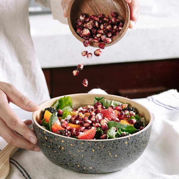 Bamboo medium bowl in dark grey (dark grey with dark coloured speckles on outside, bamboo inside) with salad inside