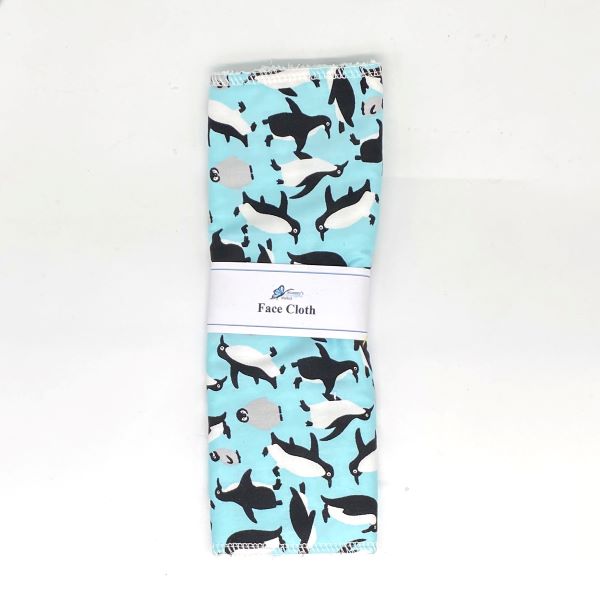 Reusable face cloth in penguins design (blue background with penguins)