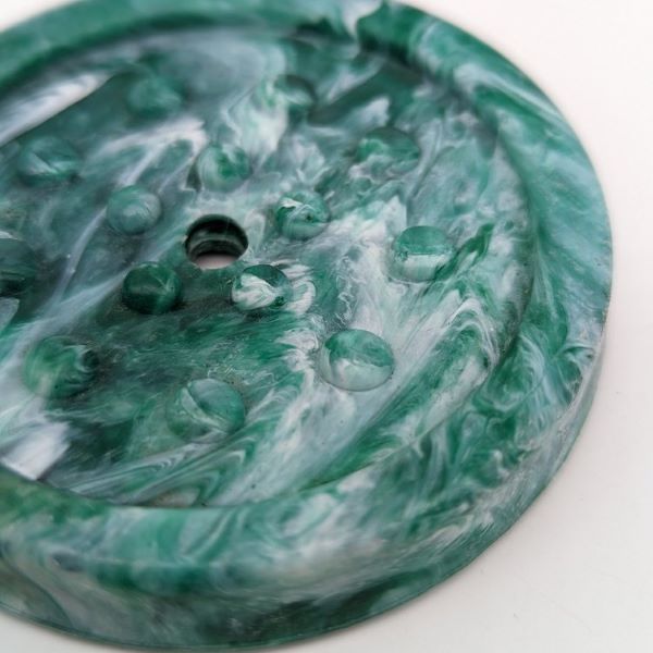 Soap dish from recycled plastic made from Ocean Plastic giving a green swirl colour