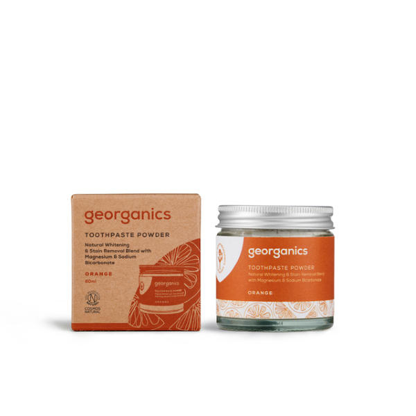 Whitening toothpowder Orange alongside cardboard box