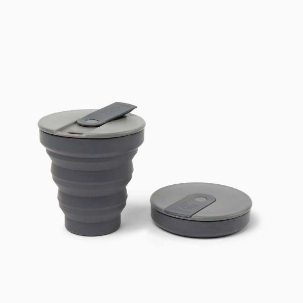 Collapsible cup shown up and collapsed in charcoal