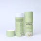 Two green cardboard cylinder boxes labelled 'Simple Living Eco Fragrance Boosters' on a white background, one shown with lid off