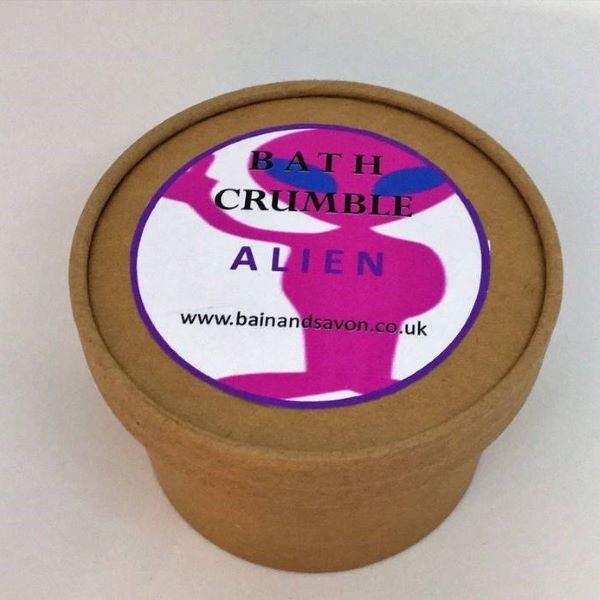 Bain and Savon bath crumble in Unicorn dust shown in paper pot with lid on