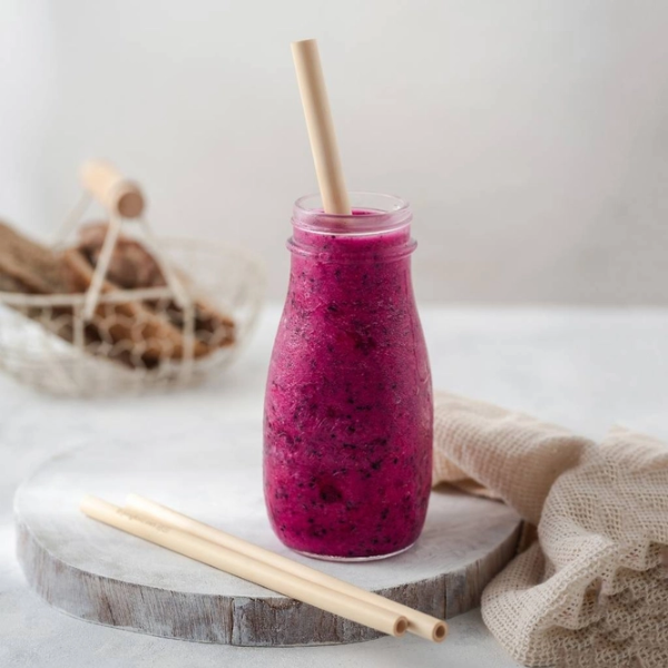 Bamboo heart straw in a berry smoothie