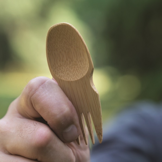 Bamboo spork shown in a hand