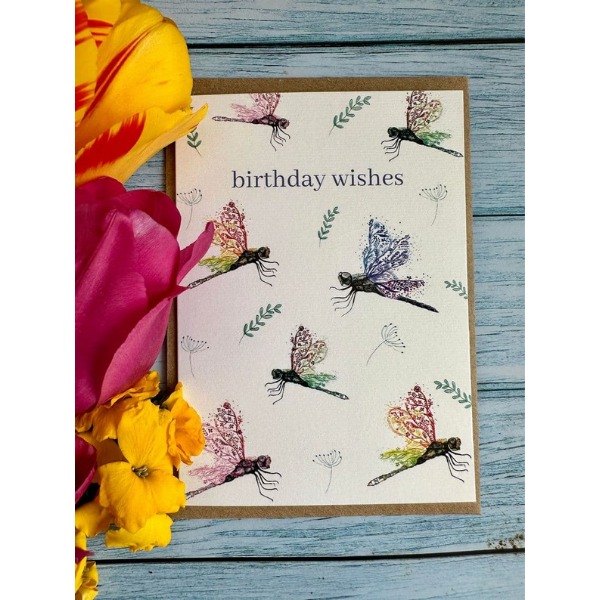 Eco birthday card, white background with colourful dragonflies and the words "birthday wishes"