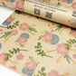 Handmade recycled wrapping paper in Blooming Lovely Birthday design (brown kraft paper with colourful flowers)