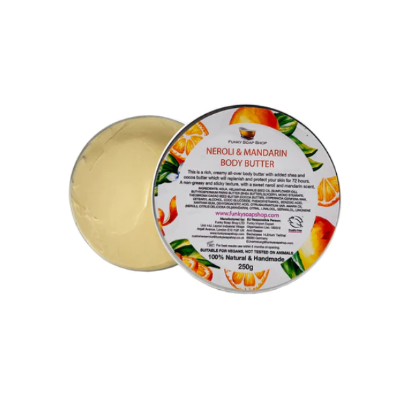 Eco-friendly vegan body butter in aluminium tin, shown open with cream inside. Neroli and mandarin.