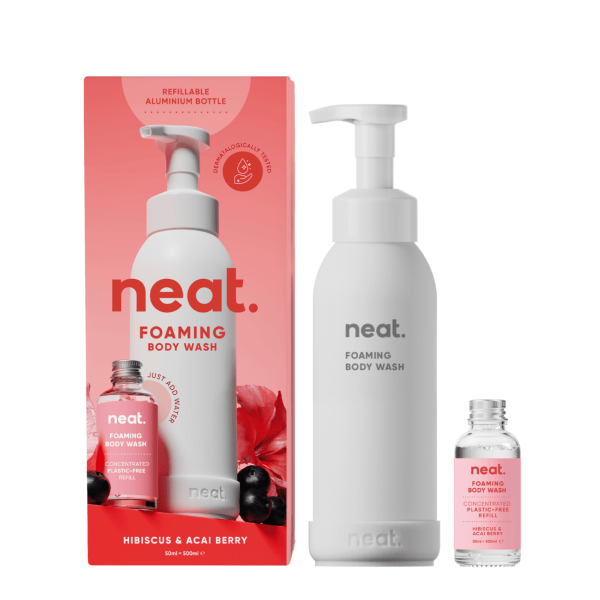 Neat body wash and refill set in Hibiscus and acai berry showing the refillable aluminium bottle next to concentrated glass bottle refill