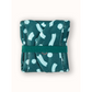 Reusable period pad in Celeste design (teal background with light blue pattern), liner, folded into itself and secured with elastic tab