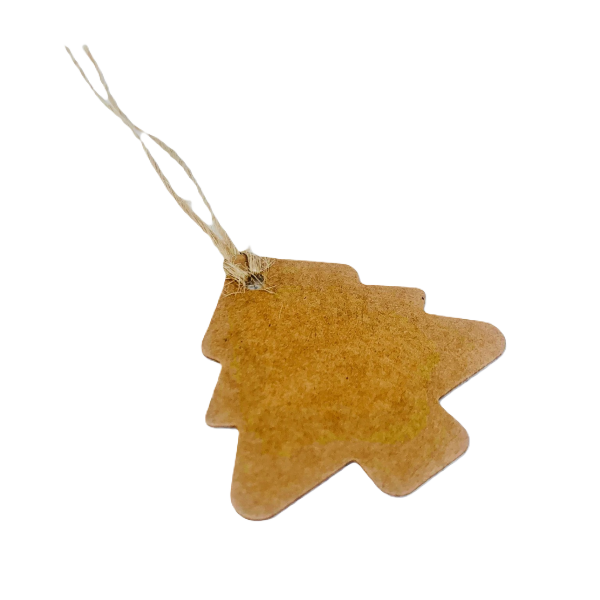Kraft paper gift tag in shape of Christmas tree with natural twine