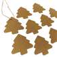 Several Kraft paper gift tags in shape of Christmas tree with natural twine