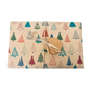 Parcel wrapped in recycled handmade wrapping paper in Colourful Christmas Trees design (brown kraft background with colourful Christmas trees in a hand-drawn style) tied with brown twine 