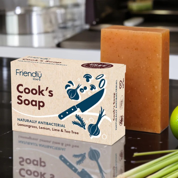 Friendly Soap's cook's soap bar, shown alongside it's cardboard packaging