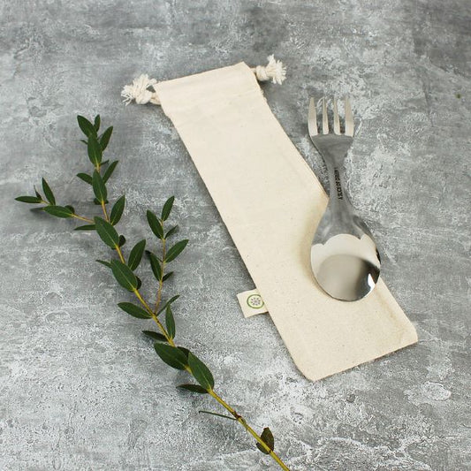 Organic cotton utensil bag shown with a steel spork on a marble surface