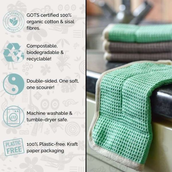 Organic sisal and cotton dishcloth in green on a kitchen worksurface with info summary (GOTS certified 100% organic cotton and sisal; compostable biodegradable and recyclable!; Double-sided. One soft, one scourer; Machine washable and tumble-dryer safe; 100% plastic-free, kraft paper packaging.