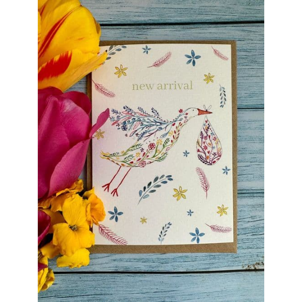 Eco-friendly card by eco artist Jen Winnett reading "new arrival" with a watercolour stork carrying a bundle