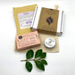 Eco-friendly gift set for a restful sleep showing the various products with the cotton packaging bag alongside a green leaf