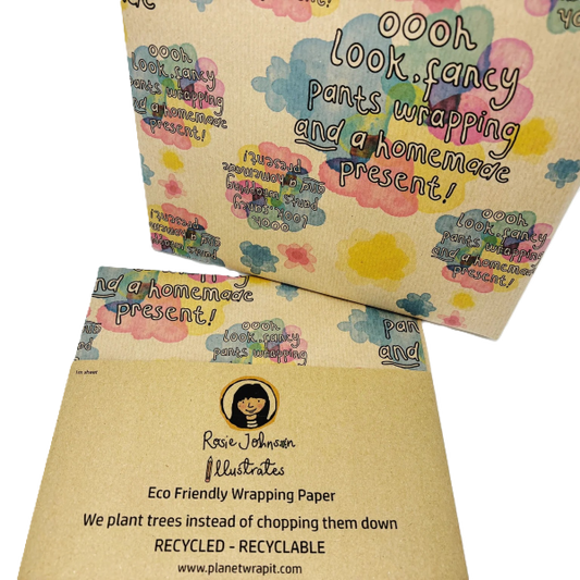 Handmade recycled wrapping paper in Handmade Fancy pants design (brown kraft paper with colourful paint spots and text reading "oooh look, fancy pants wrapping and a homemade present!"