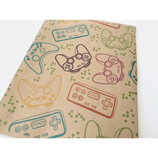 Eco-friendly recyclable wrapping paper in gamer design (brown paper with colourful gamer handsets) shown as single sheet