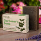 Friendly Soap gardener's soap bar shown with the bar next to cardboard box packaging and a sprig of lavender