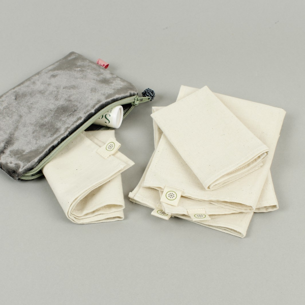 Pack of 5 cotton handkerchiefs shown next to a silver pouch