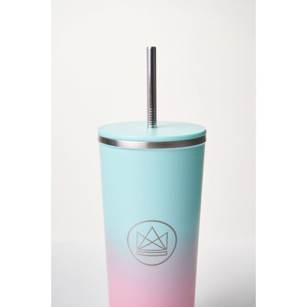 Insulated travel cup close up with metal straw in Twist and shout colourway (pink at bottom graduating to mint green at top)
