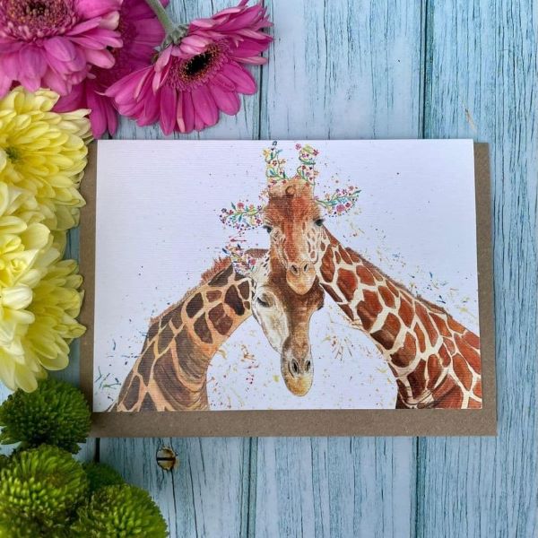 I've got you eco card with two giraffes interlocking heads