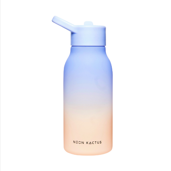 Kids reusable tritan bottle in Live Forever (peach at bottom graduating to light blue) at the top) shown with lid on