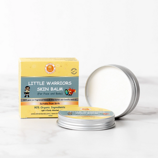 Little Warriors skin balm in aluminium tin shown with lid off and balm inside, next to cardboard box packaging