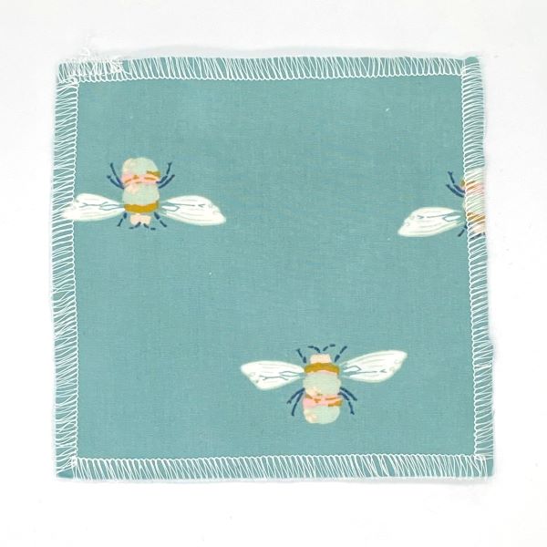 Reusable make up pad in Bumblebuzz design (turquoise background with bees)