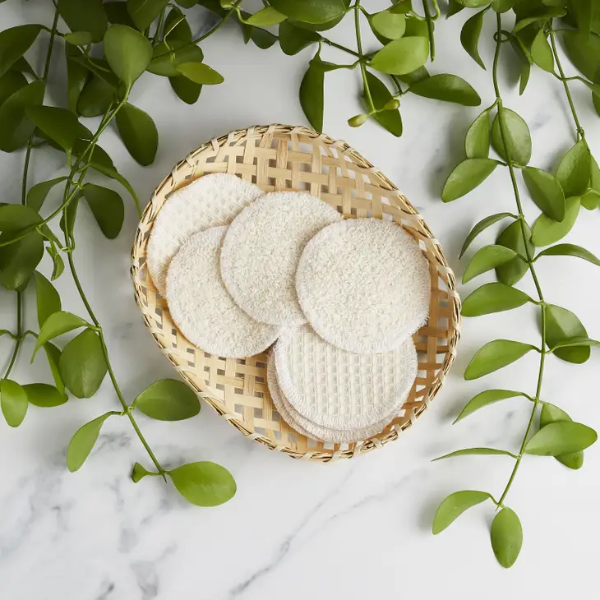 Organic cotton makeup round in a wicker basket