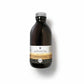 Glass bottle of Valley Mist micellar water and toner for normal to dry skin on a white background