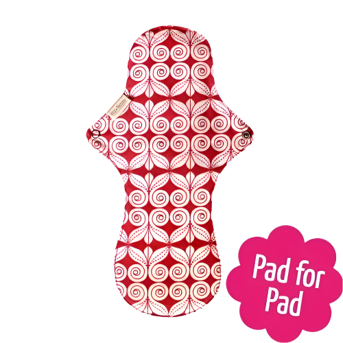 Eco Femme natural organic period night pad, showing the red and white swirl back layer