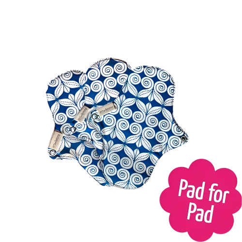 Eco Femme natural organic panty liner set, showing 3 pads with blue and white swirl bottom layer 