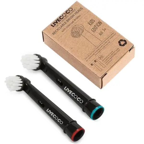 Two Live Coco recyclable electric toothbrush heads with soft bristles shown side by side next to cardboard packaging