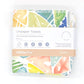 Reusable kitchen towels set of 5 in Bright leaves design (white background with various colourful geometric leaves) shown with paper band packaging