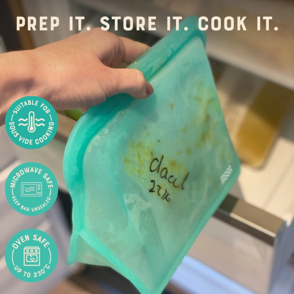 Reusable silicone food bags in xl size in a hand, filled with food and with text reading "suitable for sous-vide cooking, microwave safe keep bag unsealed, oven safe uo to 230c"