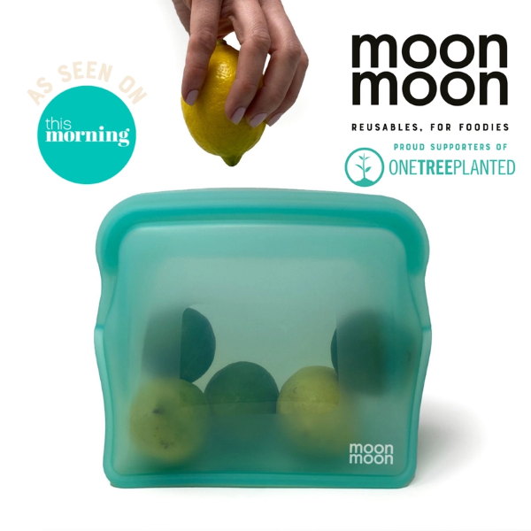 Reusable silicone food bags in xl size, with stand up functionality shown with a hand popping lemons and limes inside, with text reading "As seen on This Morning"