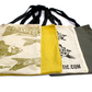Both reversible bag designs shown with print and alternative colour background