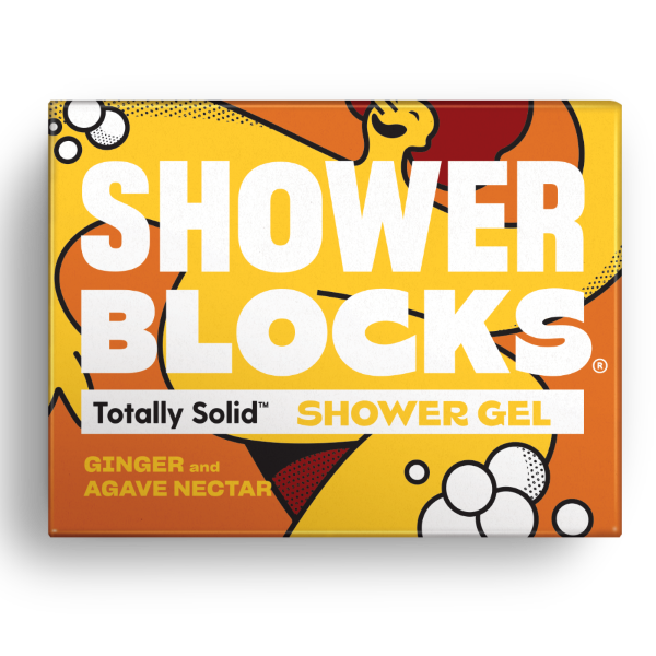 Totally solid shower gel bar in ginger and agave nectar, shown in orange and yellow cardboard packaging